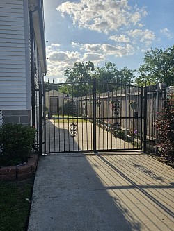 Customize iron gate with electric motor opener installed